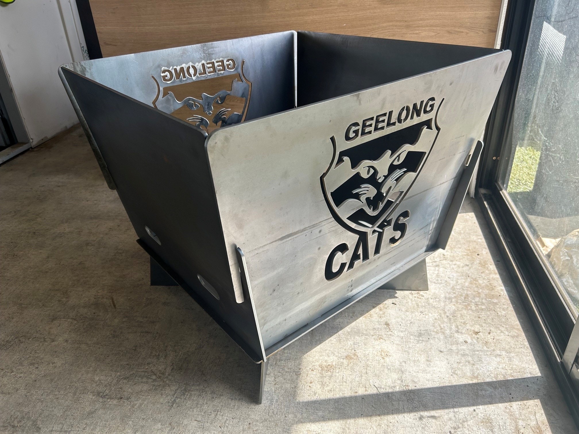 Custom laser cut Geelong Cats fire pit